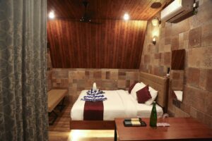 Interior view of a Private Pool Villa Suite at Cloud Cabana Holidays Vagamon with spacious rooms, modern amenities, and a private pool.
