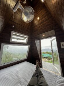 "Cozy Pyramid Hut at Cloud Cabana Holidays Vagamon with a unique design and comfortable interior, surrounded by scenic views.