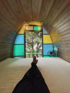 Elegant Cozy Cabin interior at Cloud Cabana Holidays Vagamon, with a well-designed layout that includes cozy bedding and functional amenities.