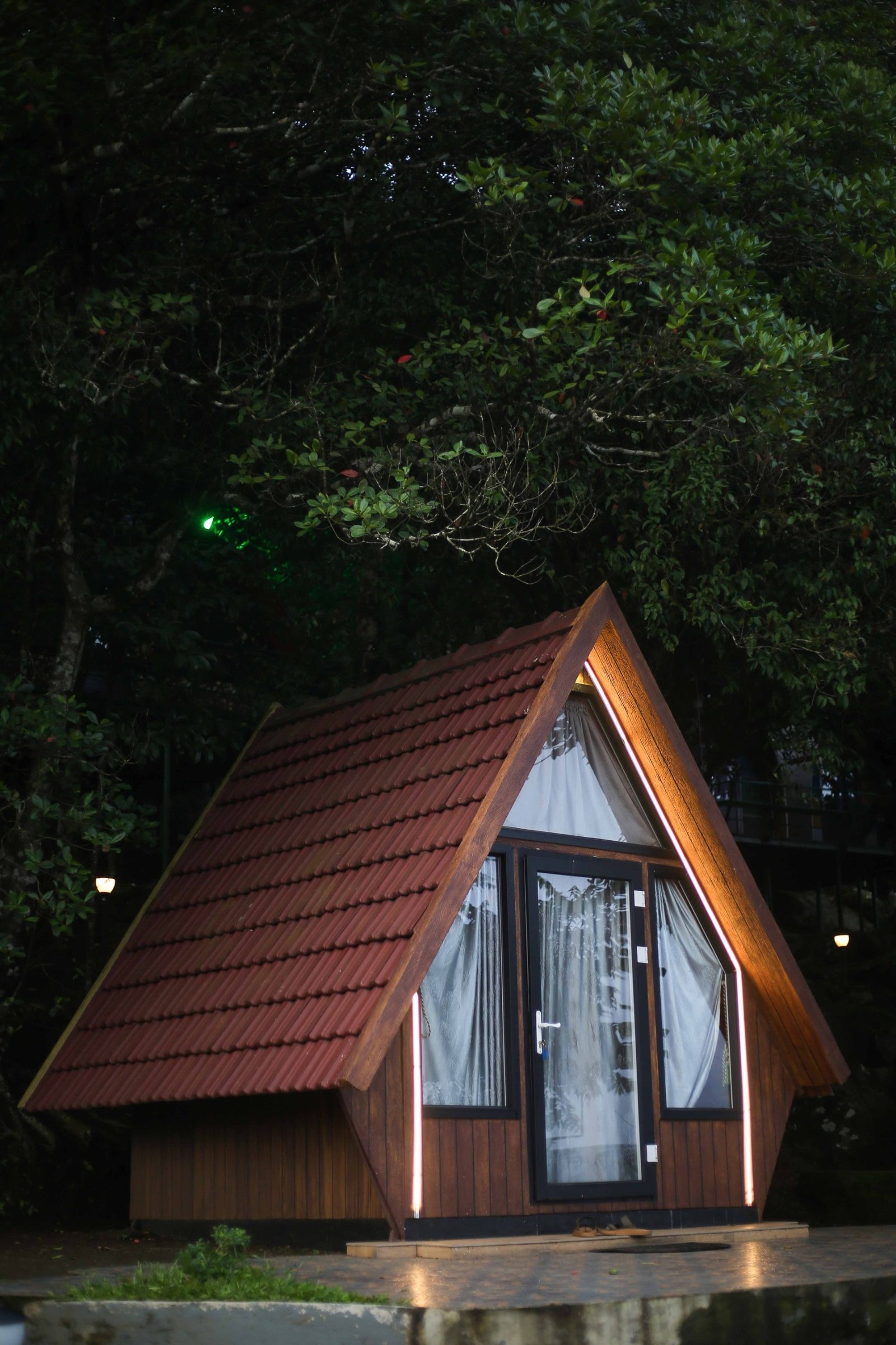 Interior of the Tiny House at Cloud Cabana Holidays Vagamon, designed for an intimate and stylish stay with essential amenities.